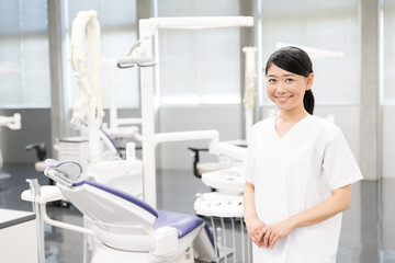 portrait of asian dentist in dental clinic