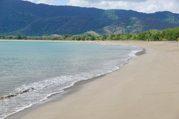 Pristine sandy beach shore of the Roche Percee, Bourail, Grande Terre island, New Caledonia, south Pacific, Oceania