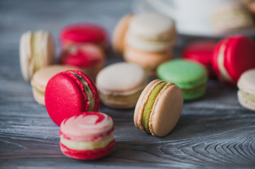 traditional french colorful macarons in a rows in a box