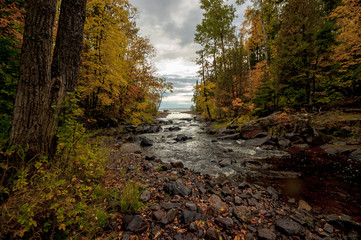 Autumn stream flowing into Lake Superior - 164222608
