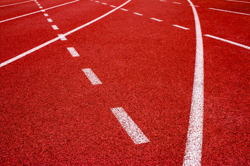 Fototapeta premium Red running track Synthetic rubber on the athletic stadium.