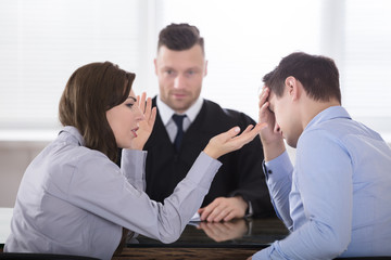 Couple Arguing With Each Other In Front Of Judge