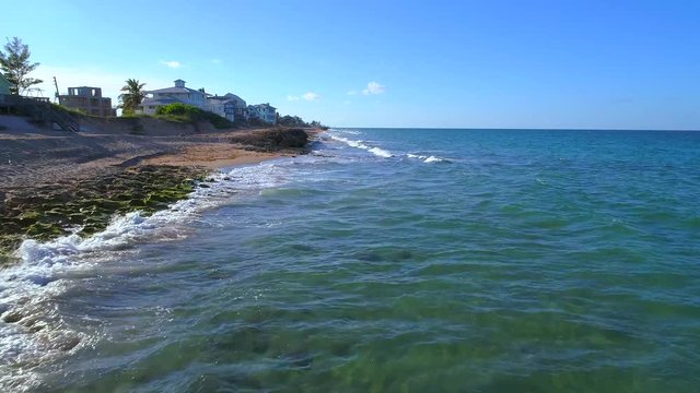 Aerial slow motion video Hutchinson Island Florida Jensen Stuart Beach 4k