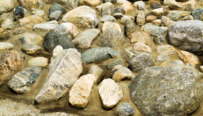 rocks and boulders in a dry creek bed