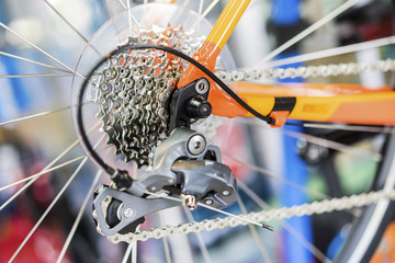 Fototapeta na wymiar Selective focus of bicycle gear on Bokeh background