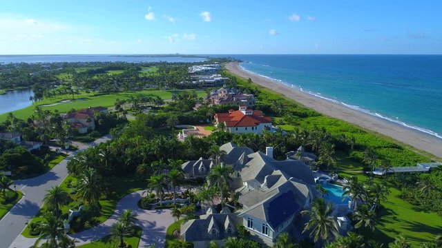 Aerial video luxury waterfront mansions Hutchinson Island Florida