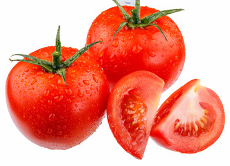 Tomatoes and tomato slices in drops of water on a white background