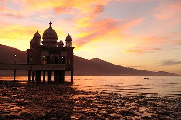 INDONESIA, JAN 8, 2017 :  Beautiful sunrise of Masjid Terapung (Mosque) in Palu, Indonesia