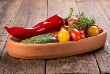 Plate with different fresh vegetables