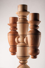 Wooden carved candle holder, white background,