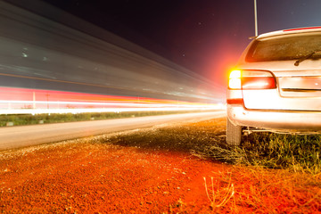 Auto near highway at night