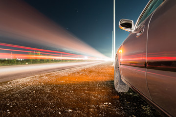 Auto near highway at night