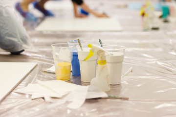 different colour paint in bottles closeup