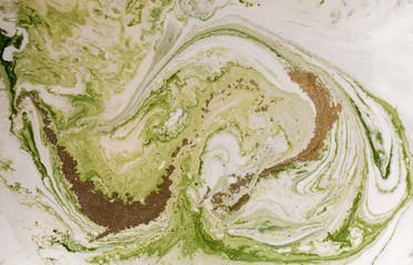 Marbled green and golden abstract background. Liquid marble pattern