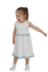 Cheerful little girl on white background isolated, vertical frame.