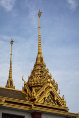 Fototapeta premium Loha Prasat Wat Ratchanatdaram in Bangkok Thailand which means iron castle or monastery is composes of five towers, of which the outer, middle and the center tower contain large black iron spires. 