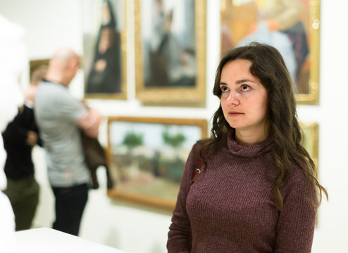 young woman in art museum .