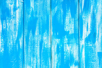 Bright wood texture, wooden background from planks painted in bl