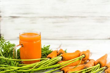 Dieting smoothie from carrots in mason jar mug, antioxidant drin