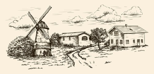 windmill, village houses and farmland