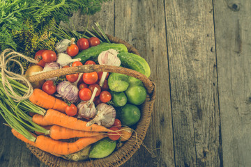 Collection of vegetables in the basket, local farming produce, toned image