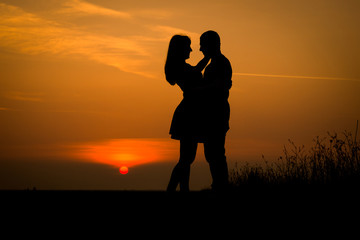 Fototapeta na wymiar sunset silhouette, couple