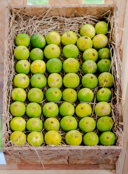 Group of lime in wooden box