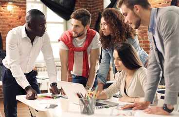 Group of five creative worker brainstorm together in office, new style of workspace, happy scene of people in office