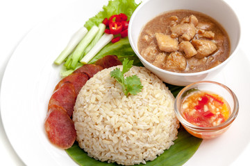 Brown rice chicken with sauce served with chinese sausage, chili and vegetable