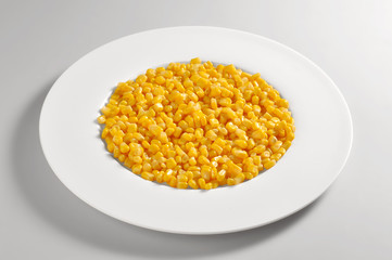 Round dish with portion of corn beans