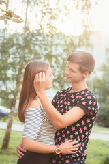 Fototapeta premium boyfriend hugging his girlfriend, and stroking her hair