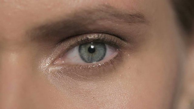 Beautiful female eye: close up opening, closing, blinking, version 4
