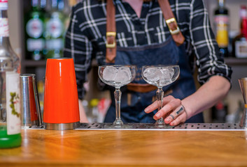 Bartender prepares a cocktail