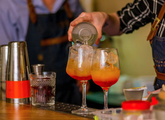 Bartender prepares a cocktail