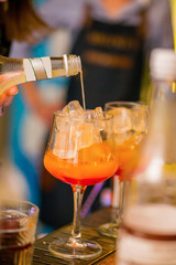 Bartender prepares a cocktail
