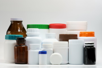 Bottles with cap on white background
