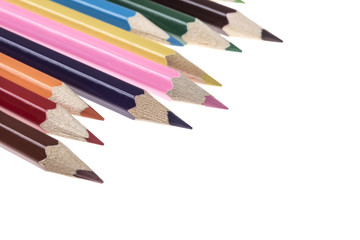 colorful crayons on white