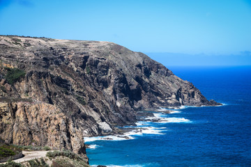 Rocky coastline at Fonte da Areia on the northern coast of Porto Santo Island, Madeira, Portugal