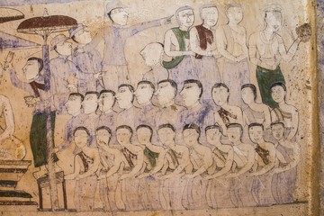 Ancient Thai Isan mural painting, The scenes of religion and life of Thai Isan people, at Wat Yang Tuang Wararam, Buddhist Temple in Amphoe Borabu, Maha Sarakham, Thailand, on November 29, 2016