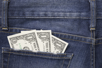 Some dollars in a pocket of jeans