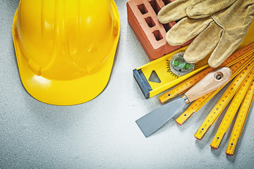 Red brick working gloves plastering trowel construction level wo