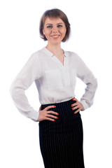 Business woman standing with hands on hips