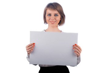 Blue-eyed Business woman holding with both hands the white poster