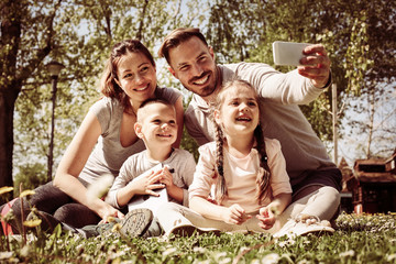 Fototapeta premium Happy family in the park.