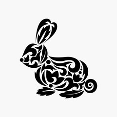 Fototapeta na wymiar Rabbit silhouette. Tattoo. Vector illustration. Silhouette of rabbit with ornament.