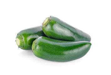 a pair of jalapeno peppers isolated on white