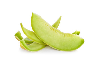 Green cantaloupe melon slices on white background