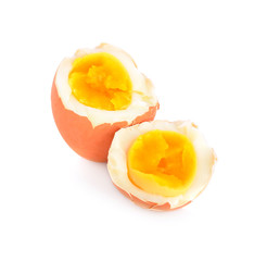 two halves of a boiled egg on white background