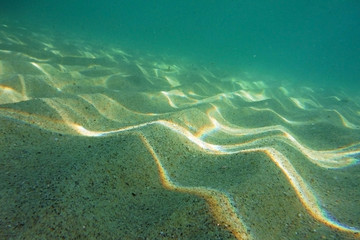 Underwater shot of sandy sea bottom