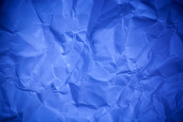 Blue crumpled paper texture background.